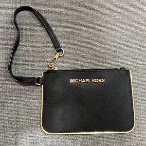 Michael Kors black and gold wristlet
